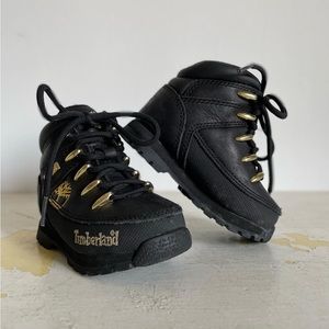 Black and gold Timberland boots